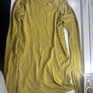 Lululemon Swiftly Tech Long-Sleeve shirt. Hip length, yellow/green color.